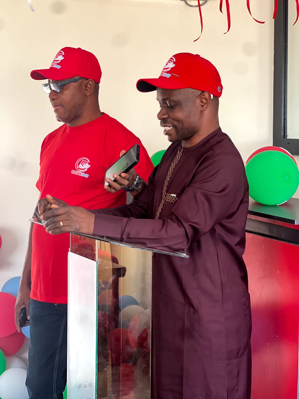 Driccher office launch speakers at podium